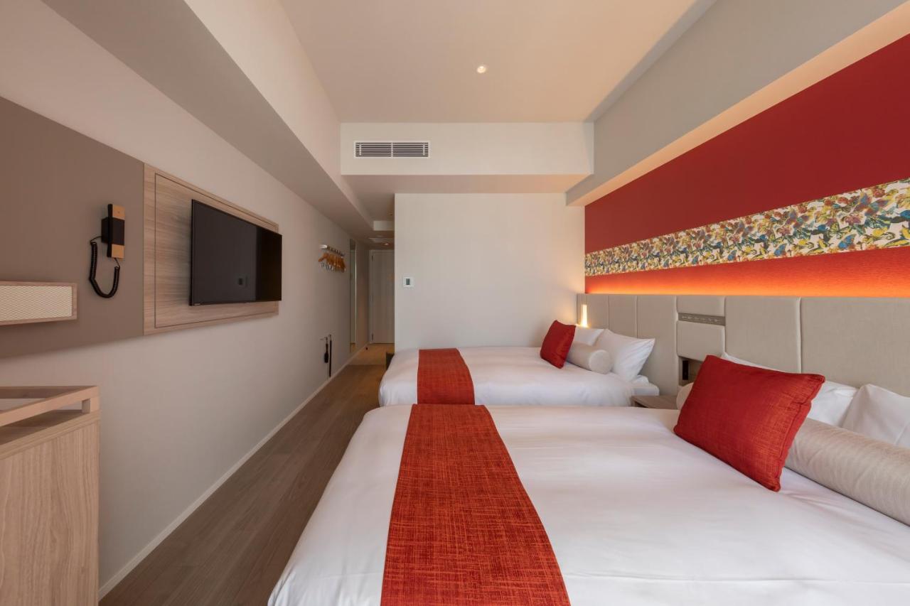 Hewitt Resort Naha Esterno foto A room at the hotel
