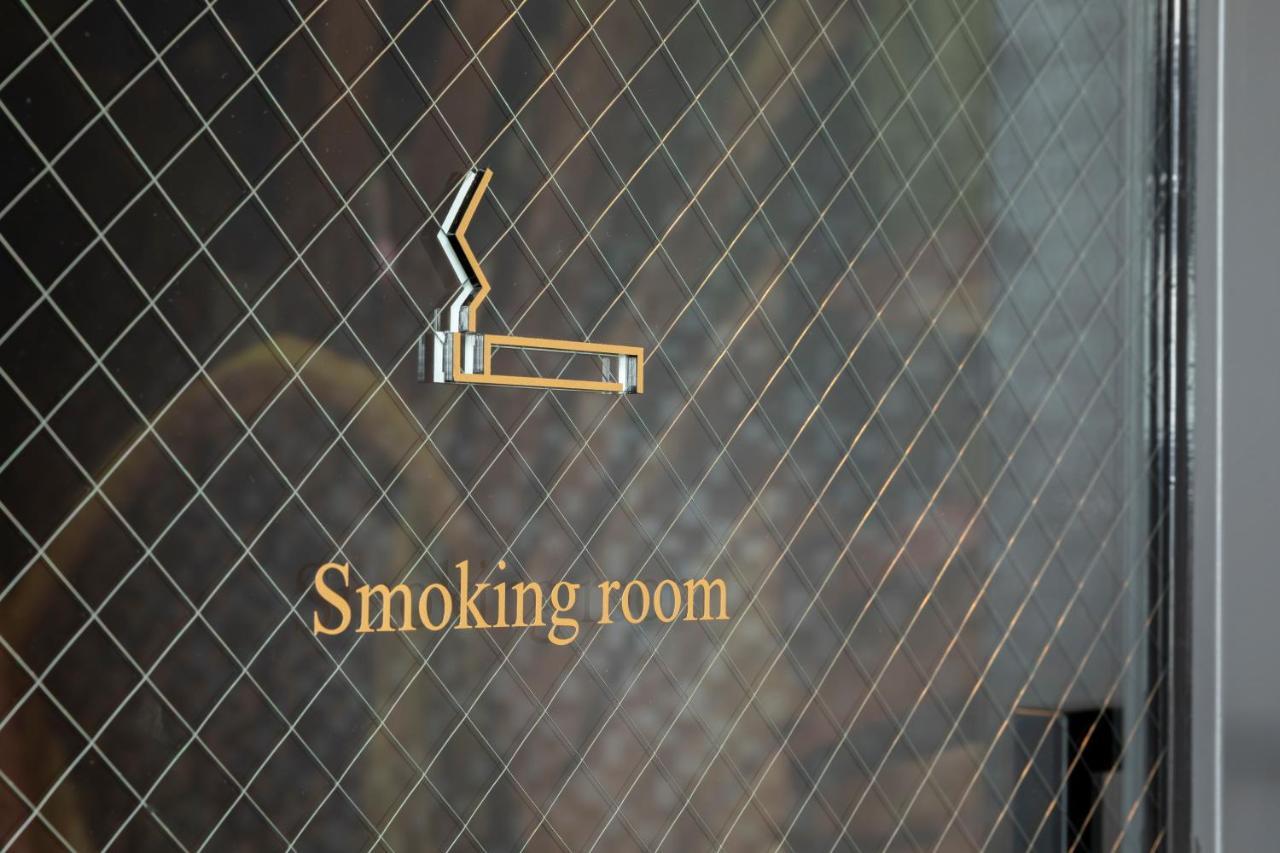 Hewitt Resort Naha Esterno foto Smoking room sign