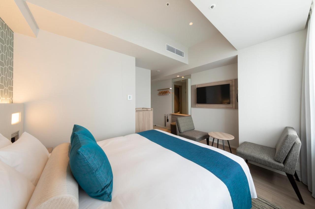 Hewitt Resort Naha Esterno foto A room at the hotel